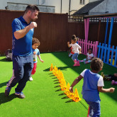 Kids playing at Tammy's Tiny Tots Nursery Kids playing at Tammy's Tiny Tots Nursery