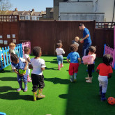 Kids playing at Tammy's Tiny Tots Nursery Kids playing at Tammy's Tiny Tots Nursery