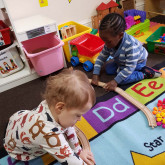 Kids playing at Tammy's Tiny Tots Nursery Kids playing at Tammy's Tiny Tots Nursery