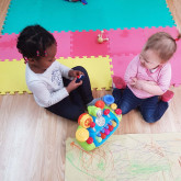Kids playing at Tammy's Tiny Tots Nursery Kids playing at Tammy's Tiny Tots Nursery